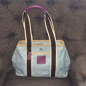 Blue vinyl coach bag